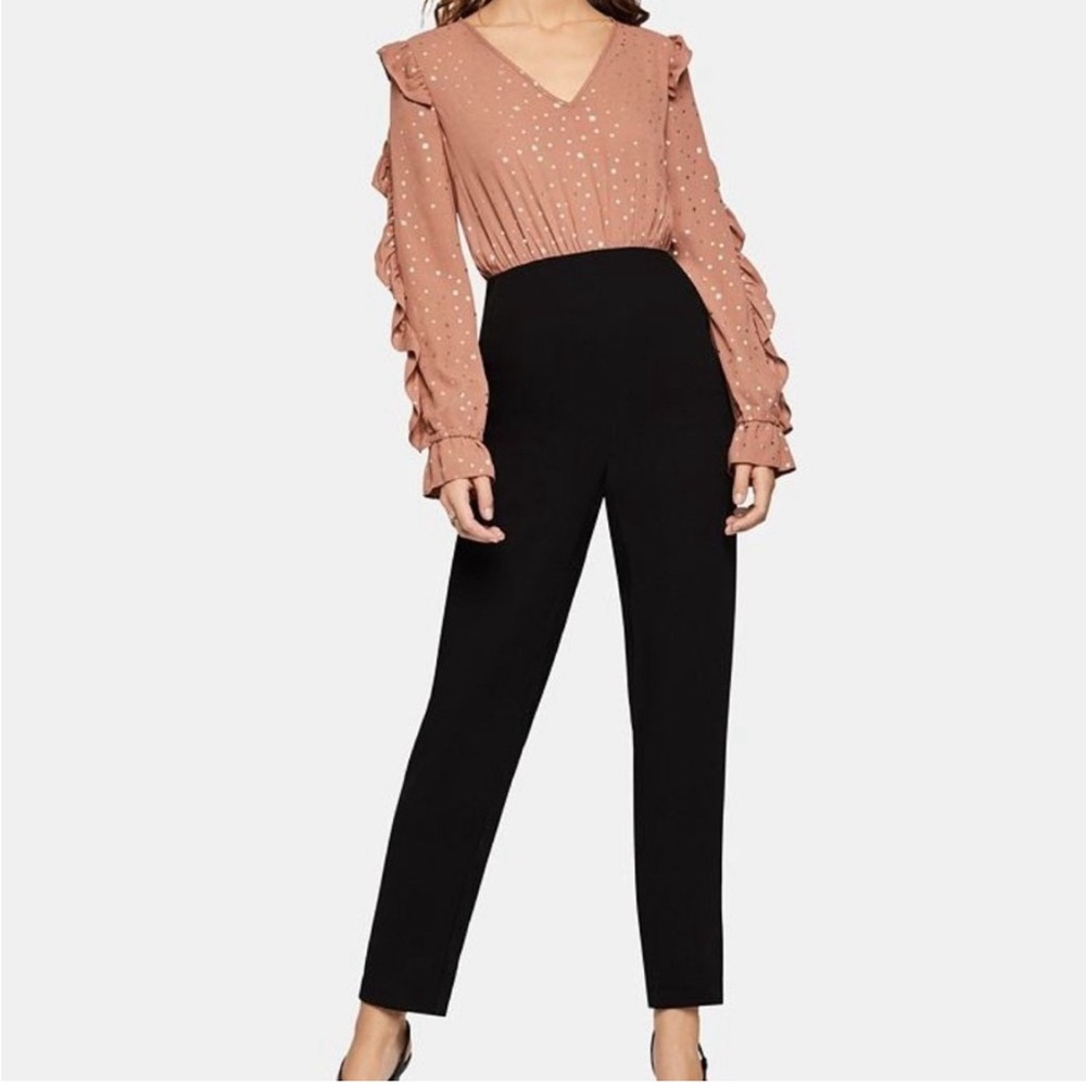 BCBGeneration pink and Black star ⭐️ Jumpsuit with V-Neckline